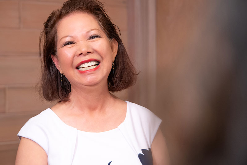 Patient Smiling at team member