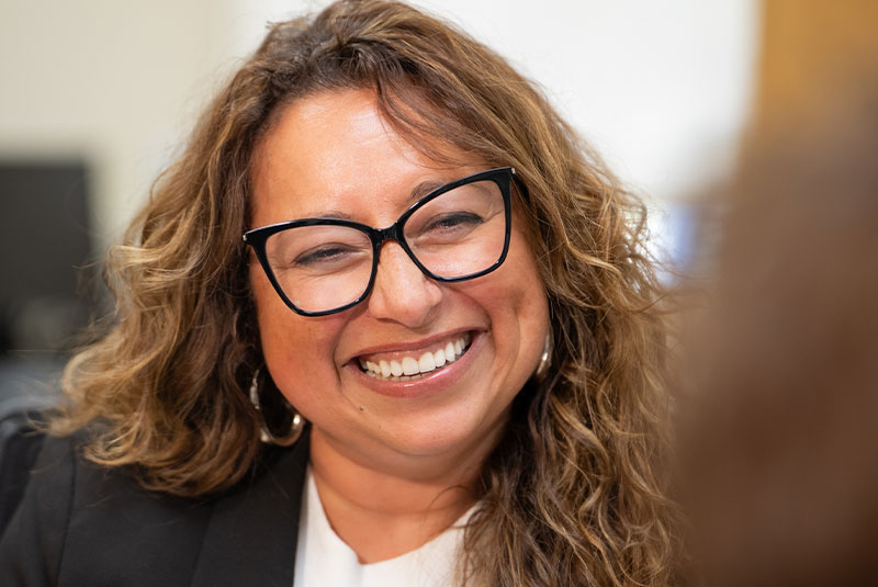 Team member smiling