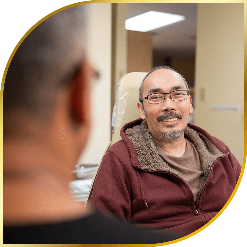 Patient Smiling with Doctor