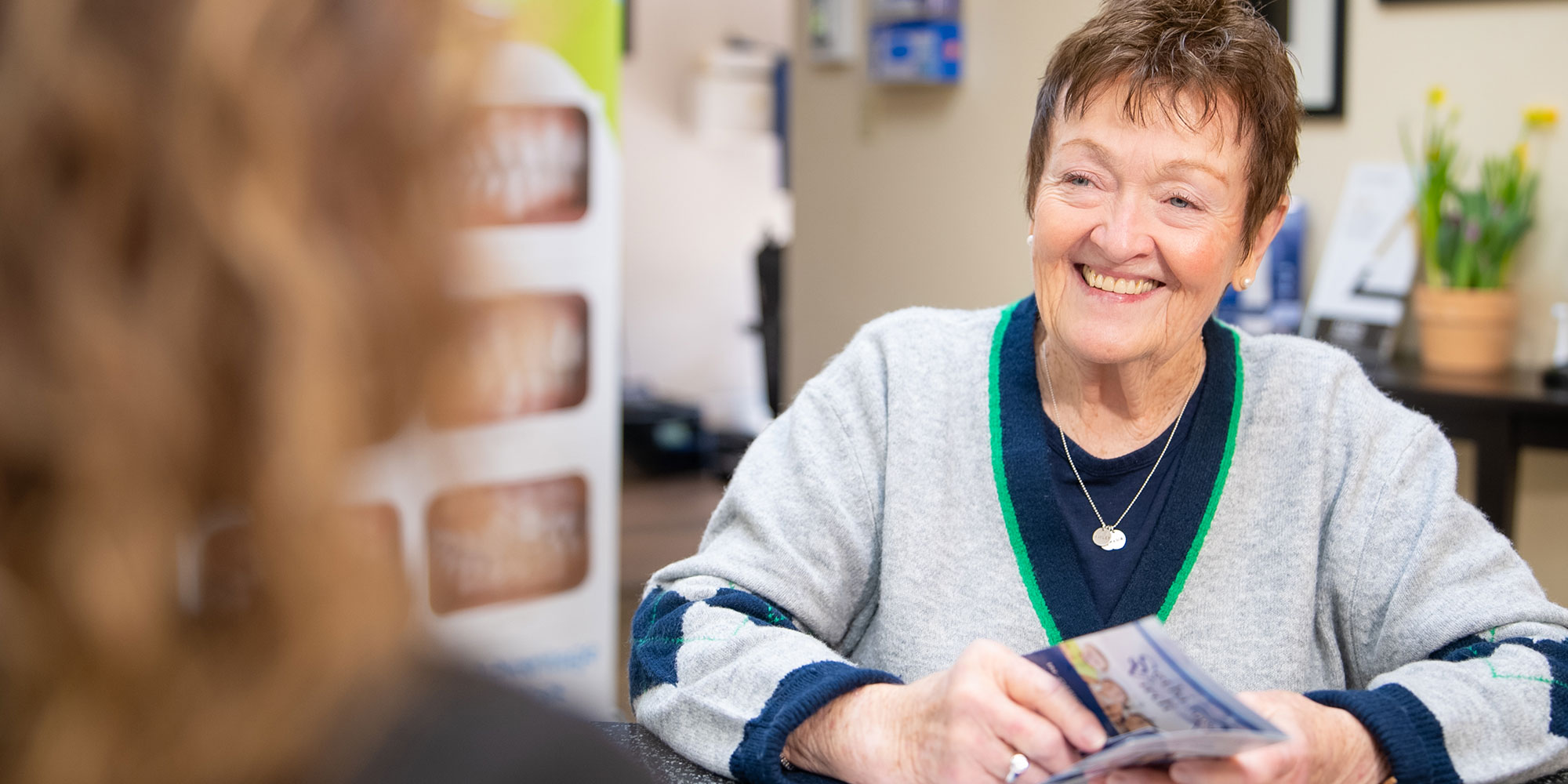 Patient going over insurance forms