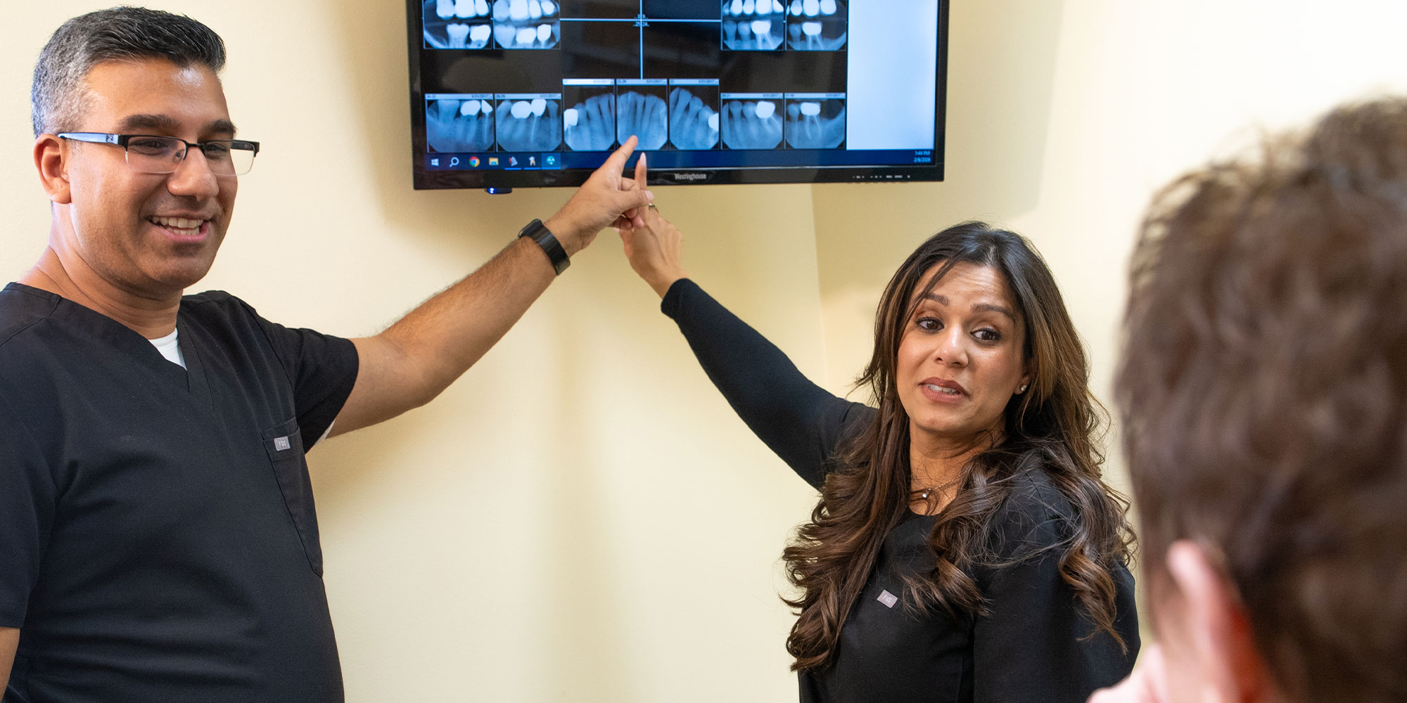 Doctor pointing at dental x-ray